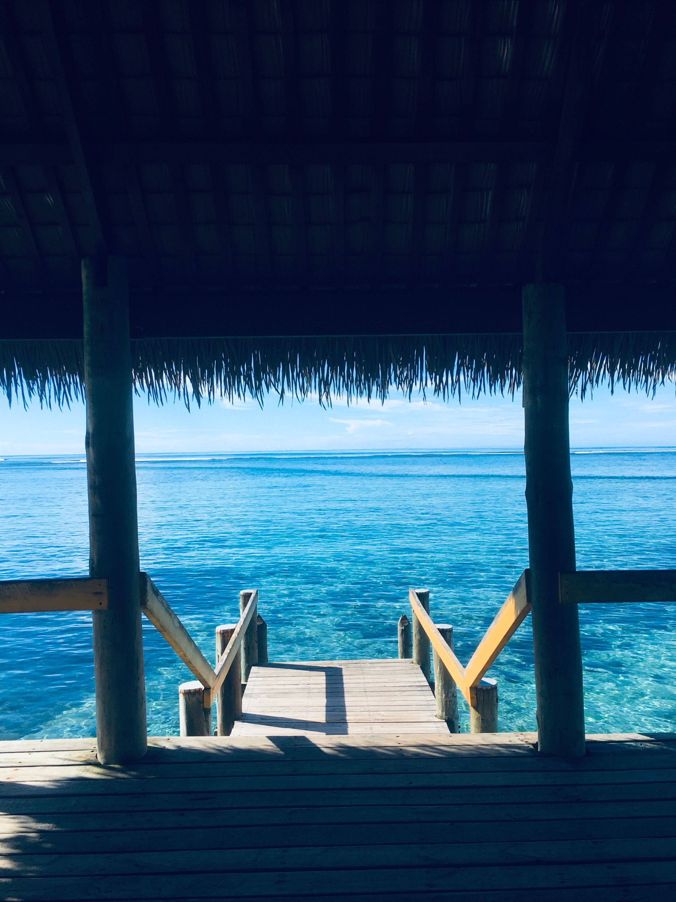 The lagoon seen from under a thatched roof